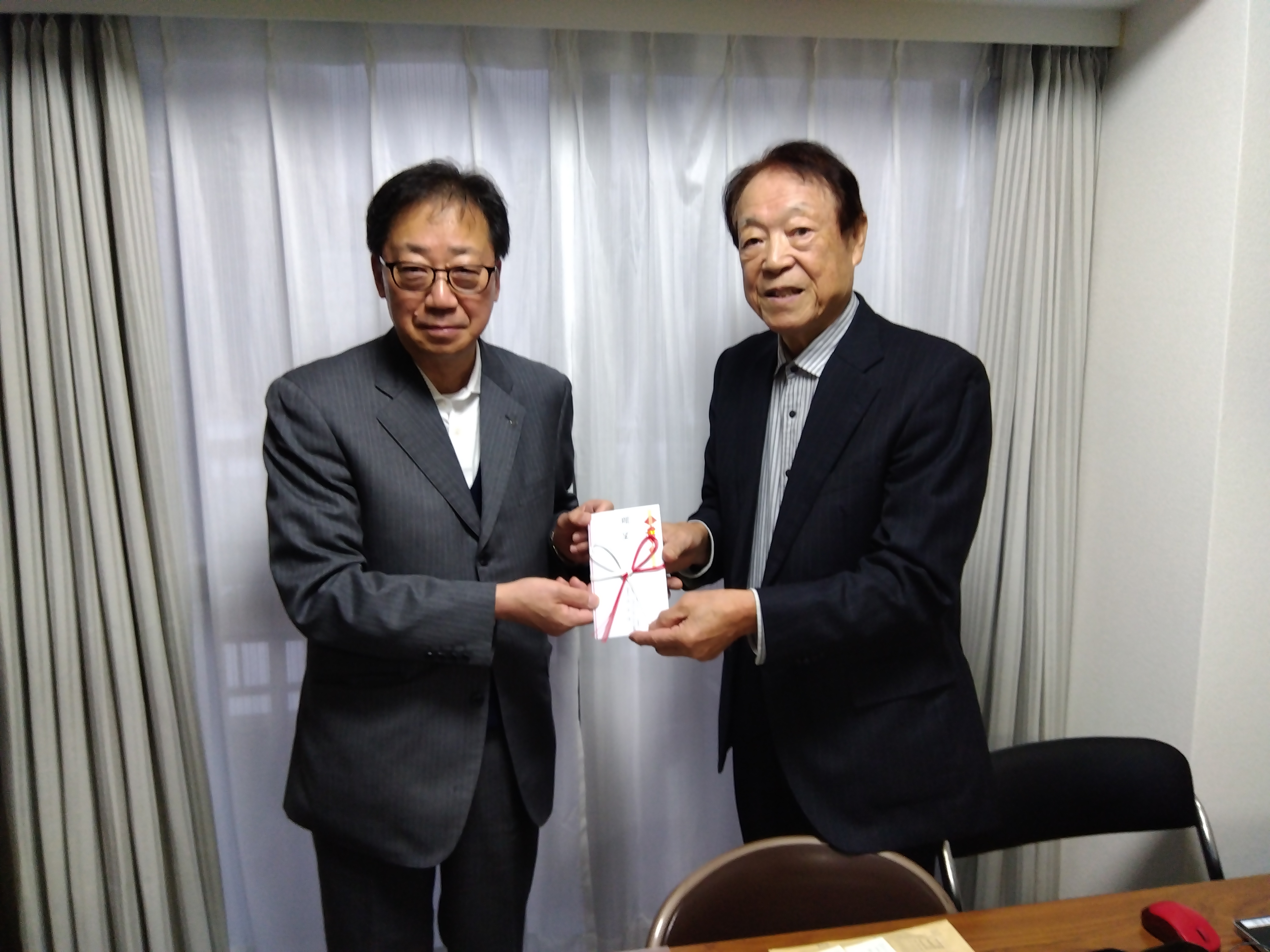 北海道信用金庫ひまわり財団の佃事務局長さんと川口谷代表理事